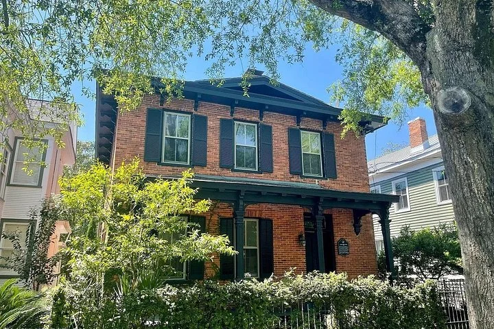Historic brick house shown in the Wilmington Coup and Massacre Historic Tour promotional photograph