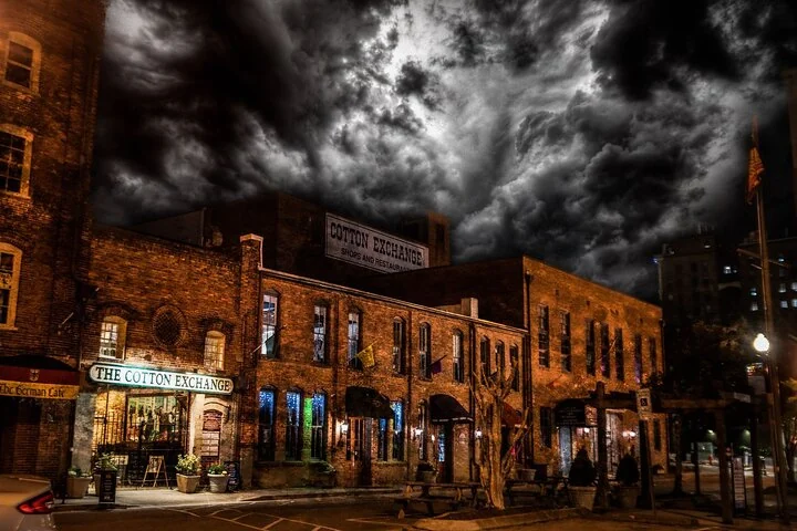 Nighttime promotional photograph of the Cotton Exchange for Wraiths and Wicked Whispers